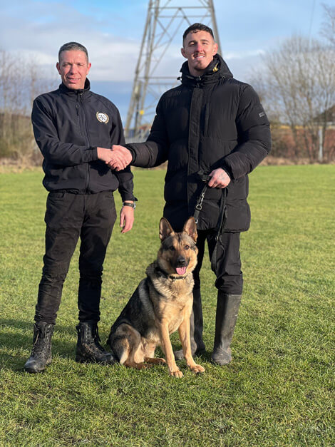 Rob Cammish with Tom Aspinall UFC Heavyweight Champion TOTAL K9 protection dogs